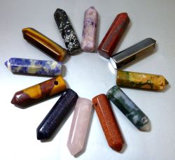mentalalchemy:  A set of twelve different stones cut and polished to six sided points and drilled to accept a small chain or cord. Stones include snowflake obsidian, amethyst, brecciated jasper, mookaite, sodalite, golden tigereye, blue goldstone, rose