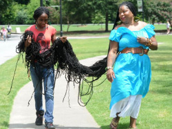 babybints:  flyandfamousblackgirls:  Asha Mandela is the Guiness Record’s “World’s Longest Locs”. She is often referred to as the “9th Wonder of The World”. Asha started growing her locs more than 25 years ago. Her locs are longer than 25