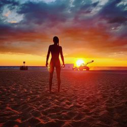 a-nakedgirl: Something that was always on my bucket list, to see the sun rise from the sea in Spain 🇪🇸. I was almost alone except for the tractor guy that was straightening the sand. What a wonderful job does he have to see this every morning. 