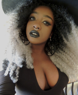 nigeria-connection:  What a hot black witch! I think she owns a bunch of white zombie slaves :-)