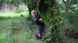 ghvstlimbs:  medea-and-morticia:  archiemcphee:  Who is that cheerful man with the adorably double-braided beard and why is he dressed up as a Japanese schoolgirl? Kotaku’s Brian Ashcraft has the scoop: This is Hideaki Kobayashi and he’s known (and