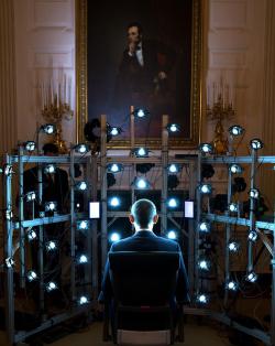 thetallblacknerd:blazepress:  Obama sitting down for the first 3D presidential portrait photograph in history.  Obama looks like he just found new mutants using Cerebro 