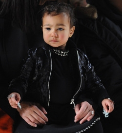 kimkardashianfashionstyle:February 14, 2015 - Kim Kardashian &amp; North West at the Alexander Wang Fall 2015 Fashion Show in NYC.   