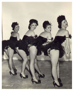 burleskateer:Vintage 50’s-era photograph features a quartet of showgirls posing Backstage, at an unidentified nightclub or theatre..