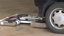 sizvideos:  Autonomous robot system for vehicle transportationVideo