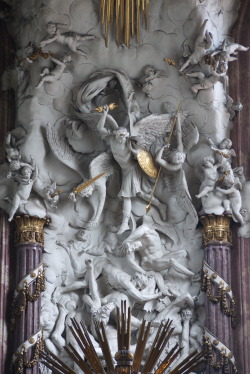 signorcasaubon: Detail: The Reredos of the High Altar of Michaelkirche (Saint Michael’s Church), in Vienna’s historic Innere Stadt, showing the Taxiarch trampling down the fallen angels into Hell. 