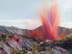 justgo-up:  thousands of flower petals covering a town, blasted from a neighboring volcano, in Costa Rica.  photographer Nick Meek. commercial shot for Sony. 