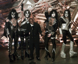 twixnmix:       Tupac and Kiss at the 38th Annual Grammy Awards on February 28, 1996.  This was the first time the original lineup of Kiss appeared in public together in full makeup since December 1979. They presented the award for Best Pop Performance