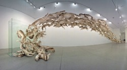 doctornsara: davidgilmoursmanboobs:  sixpenceee:  Cai Guo-Qiang takes an interesting look at pack mentality with his amazing installation piece, “Head On”. Striking in its size and energy, “Head On” consists of ninety-nine life-like wolves constructed
