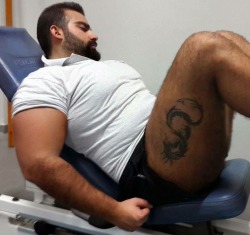 Big handsome, muscular man.  Would love to have his massive hairy legs wrapped around me - WOOF