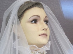 La Pascualita or Little Pascuala is a bridal mannequin that has “lived” in a store window in Chihuahua, Mexico for the past 75 years. That is quite a long time for a bridal gown shop to retain a mannequin, but then the dummy has a rather strange history