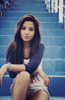 so-hot-and-so-dangerous:  Beautiful brunette girl sitting in blue stairs 
