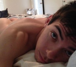 naked-straight-men:  In bed with my cat Scully 