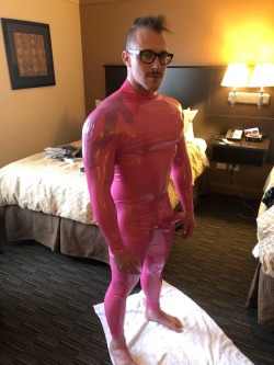 divo1972: rbrlover:         I got to meet the very sexy and sweet Blake Hunter  and put him in my transparent pink rubber catsuit with cock and anal sheaths. He looks amazing in it as you can see. Both sheaths were put to good use  till the bubblegum