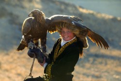 nemertea:  peashooter85:  13 year old Mongolian huntress Ashol Pan and her golden eagle. Photos by Asher Svidensky  The best part of this is how happy she looks. I’m so glad being a tiny badass is enjoyable. 