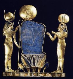 zooophagous:  grandegyptianmuseum:    A pectoral depicting the birth of the sun from the burial of Queen Kama on Leontopolis mother of Osorkon III and possibly wife of Shoshenq IV (gold, lapis-lazuli, silver and glass). The ram-headed god Khnum is flanked
