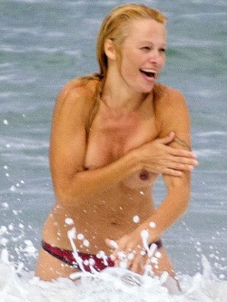 toplessbeachcelebs:  Pamela Anderson (Actress) swimming topless in France (June 2013)