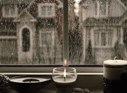 fullblownpanic:  intrepidprofessor:  bonsaibones:  I’m in love with this gif. Everything about it. The rain drizzling. The candle flickering. The colors. I love it.  This is how I would want my home to be set. A candle lit on a windowsill where the