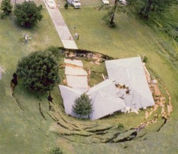 crownprince81:  darkmoonperfume:  northclackitback:   Massive sinkhole swallows house in Florida  Florida is hell, like look at this shit. Black people cant walk down the street, there are giant alligators and shit in ya swimming pool just waiting to