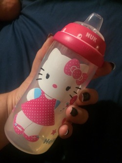 lilprincesssierra:  Drinking strawberry juice out of my Hello Kitty bottle!