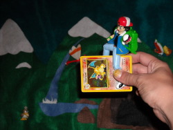 msdemonu:  ASH RIDING A CHARIZARD! YEAH!I hope I’m not the only person who plays with their Pokemon toys and cards, still. 
