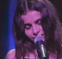 violentwavesofemotion:  Mazzy Star performing Fade Into You in 1994 (MTV): “A stranger’s light comes on slowly, a stranger’s heart without a home, you put your hands into your head, and then smiles cover your heart…”