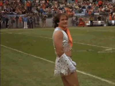 blondebrainpower:  Robin Williams was an unbelievably talented comedian — and not half bad as a Denver Broncos cheerleader, either. The late actor briefly joined the Broncos cheering squad in November 1979, donning a white sequined mini-skirt, go-go