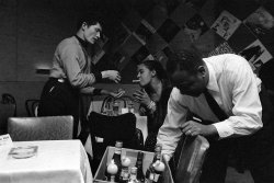 themaninthegreenshirt: Billie Holiday getting a light from a waiter at Sugar Hill.  In 1957, New York photojournalist Jerry Dantzic spent time with Billie Holiday during a two-week run of performances at the Newark, New Jersey, nightclub Sugar Hill. 