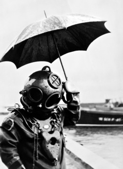 Scuba diver with an umbrella, 1949. In 1943, Captain Jacques-Yves Cousteau invents, with Emile Gagnan, the first commercially successful open circuit type of Scuba diving equipment, the aqualung.