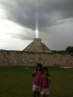 sixpenceee:  When Hector Siliezar visited the ancient Mayan city of Chichen Itza with his wife and kids in 2009, he snapped three iPhone photos of El Castillo, a pyramid that once served as a sacred temple to the Mayan god Kukulkan. A thunderstorm was
