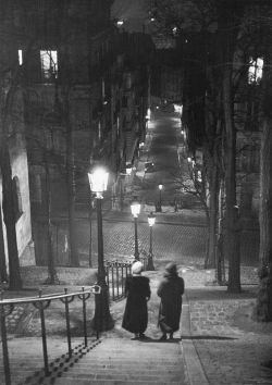  Pair of prostitutes descending stairs after dark in Montmartre, Paris, 1930. Photographed by Alfred Eisenstaedt-LIFE.  