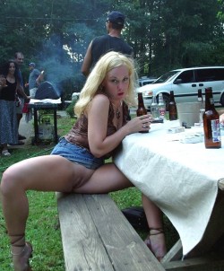 pussymodsgaloreAlfresco flashing. Pretty girl showing off her pussy at the barbecue. What is she about to do with that bottle? Her pussy looks as if it could do with stretching and gaping. (Hairless pussy is the minimum mod to qualify for PMG.)