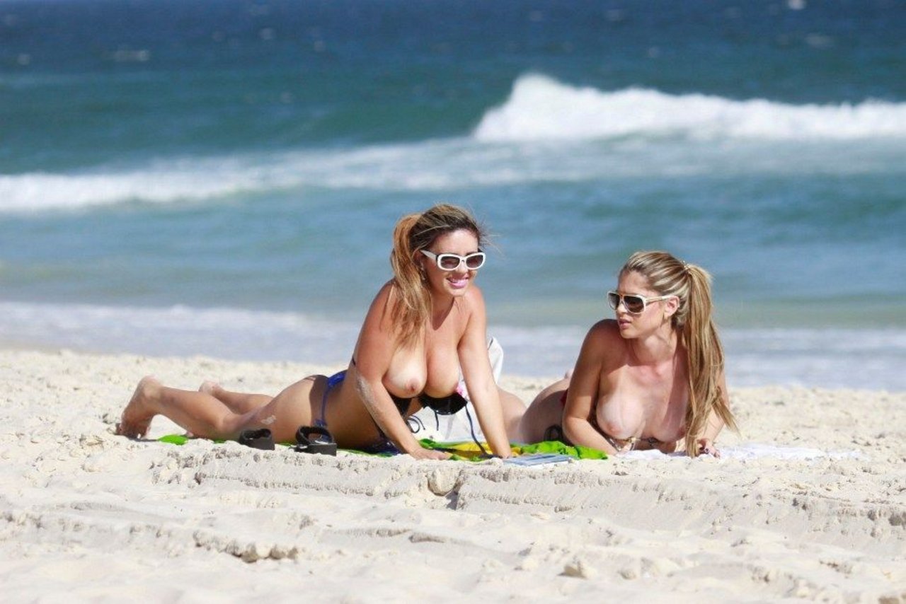 toplessbeachcelebs:  Fernanda Araldi and Larissa Gomes (Brazilian Models) sunbathing