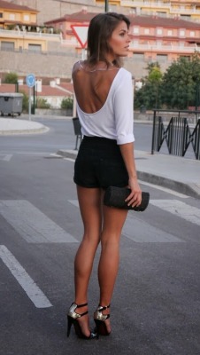 greatlegsandhighheels:  Stunning tanned and toned legs in short shorts and strappy metallic heels
