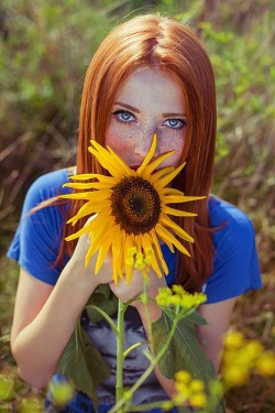 Blue-eyed ginger beauty.