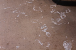 aesonissa:Footprints of paint were being scrubbed away as the