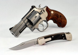 gunsknivesgear:  Smith &amp; Wesson &amp; Buck, two classic American brands.  I would love to have this knife and gun on the trail with me, maybe somewhere in the Appalachians, nothing but high mountains and blue sky…
