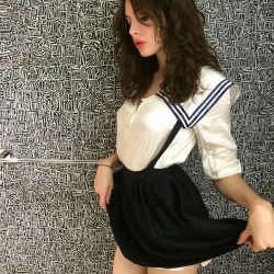 lecoledesfemmeslaurasfez:  @charlottekempmuhl Wearing la sailor blouse and criss cross suspender skirt photo by @sean_ono_lennon   Permission to cum aboard