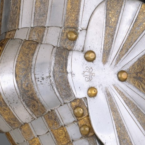 fablesandgables:  Elements of a Light-Cavalry Armor, Italian ca. 1510  Steel, etched and gilt; Wt. 19 lb. 13 oz. (8987 g)  This is a rare example of Italian armor decorated with fluted surfaces in the German fashion. Its etched and richly gilt decoration