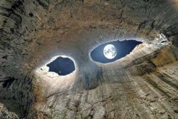 fuckyeahpaganism:  meditationtemptation:  &ldquo;The Eyes of God&rdquo; -Prohodna Cave, Bulgaria (Source, I believe) This is the full moon from inside a cave. It looks like two eyes staring down at you; beautiful.  I want to go here