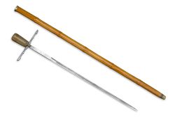 art-of-swords:  Sword Cane Medium: steel, bamboo, horn, gold Measurements: overall length 35 7/8 inches (91.12cm) The walking stick conceals a two-sided 23-inch blade within its bamboo shaft. There is a pair of spring-loaded hilts are also contain within