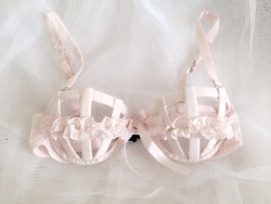 dollymilk:  i had a bunch of boning from a failed project so i also wanted to try making a cage bra. i took the underwires out of a bra i used to wear all the time and it pained me to do so!! Also I wasn’t gonna put the ruffle there but uh..I don’t