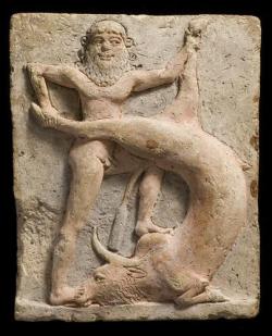 archaicwonder:  Gilgamesh Kills The Bull of Heaven This is a Neo-Sumerian terracotta votive relief (c. 2250-1900 BC) showing Gilgamesh, the legendary King of the city of Uruk (map) fighting against Gugalanna, the Bull of Heaven. In Sumerian mythology,