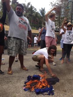 failsnail:  black-australia:  rooms-alone:  Aboriginal activists burn the Australian flag in an act of decolonization  Resist. Revive. Decolonize.   Burn some more please 