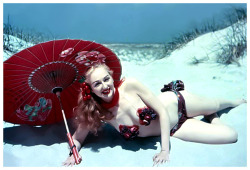 Lynne O’Neill models one of her self-made swimsuits, somewhere in the dunes near one of Long Island’s many beaches..
