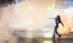 guardian:  Ferguson: Protesters and riot police have clashed again amid renewed tension over the shooting of an unarmed teenage boy by a police officer. A 24-hour period of relative calm came to an end after local police released a video that appeared
