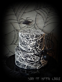 thecakebar:  Halloween Spider Web Cake {click link for FULL instructions) How brilliant is this? The spider web is made of Marshmallows! :O Instructions for Marshmallow Spider Web: STEP 1 : Cover your cake(s) in black fondant. STEP 2 : Place marshmallows