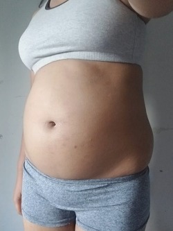 pixelsword-belly:  I stuffed myself with cheetos, ramen, and a liter of ice tea. I look like I swallowed a watermelon!    These stuffings are really making an impact on my figure because my black ripped jeans I just bought in June are getting quite tight.