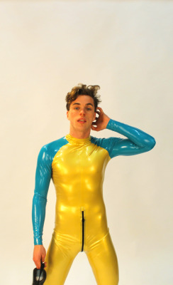 allofthelycra:  zentaiboy27:  libidex:  Gorgeous Male model in our  Sidewinder catsuit in Pearlsheen Gold and Turquooise  He’s gorgeous 😍  Follow me for more hot guys in lycra, spandex, and other sports gear 