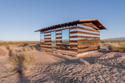 dezeen:  Lucid Stead installation by Phillip K Smith III makes a desert cabin appear transparent 